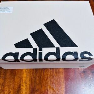 Adidas Black and Gold Sneakers